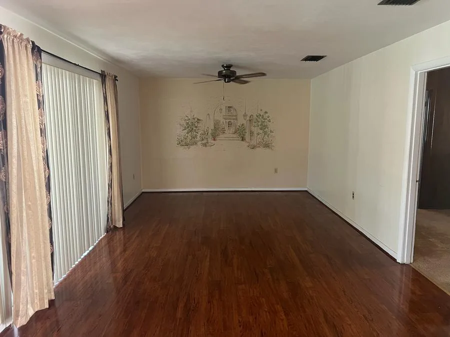 Living Room Transformation — before (Full Rehab) — Exodus Home Solutions, Polk County FL